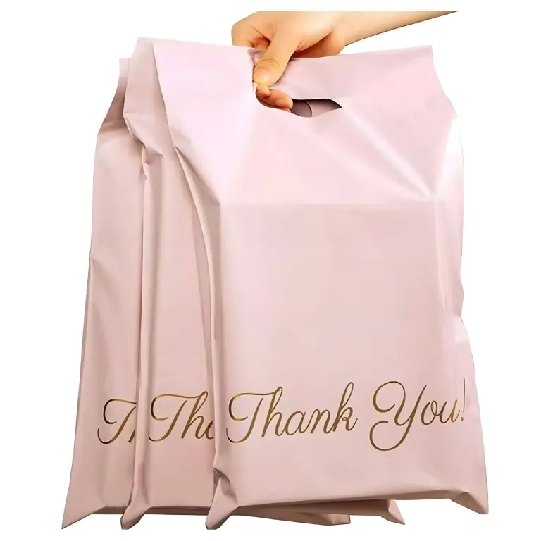 Pochettes d’expédition roses avec poignée et inscription « Merci » – 310 × 420 + 70 mm – Lot de 50